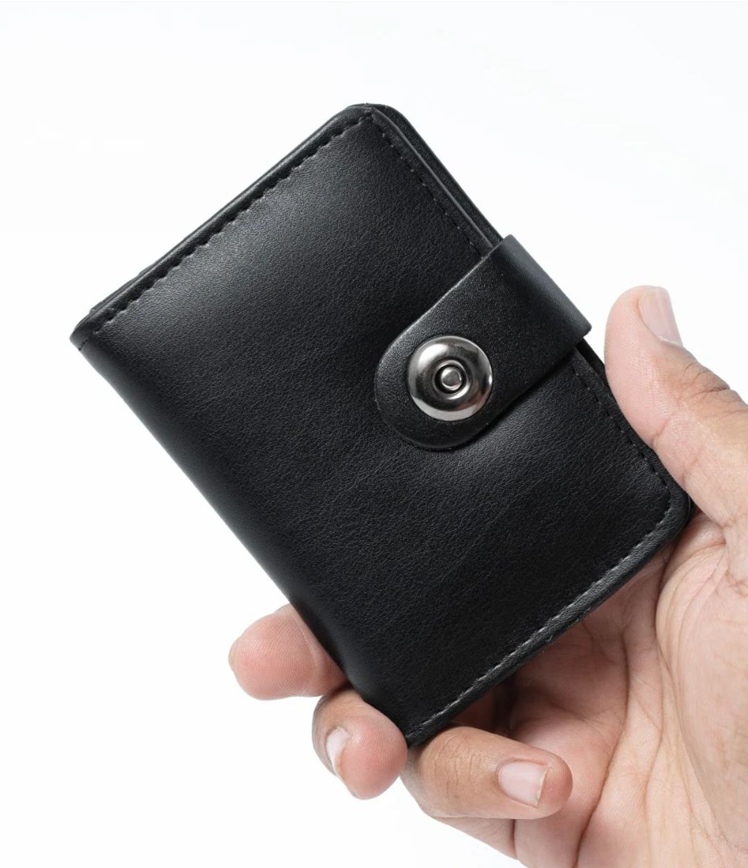 Plain rexine smart wallet with minimal button closure, slim and stylish design for men and women, easy to carry, random color.         Is this helpful so far?    Ask ChatGPT